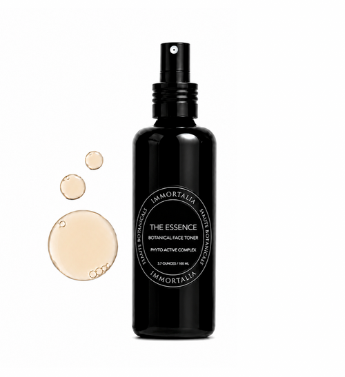 Black bottle of Immortella toner with droplets on a white background